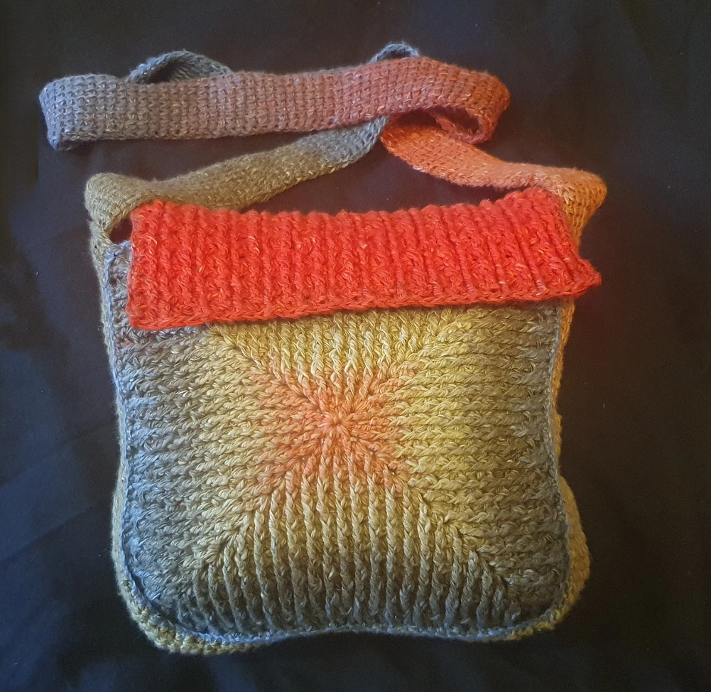 Hand‑knitted colourful shoulder bag by Micotton — wool blend — London